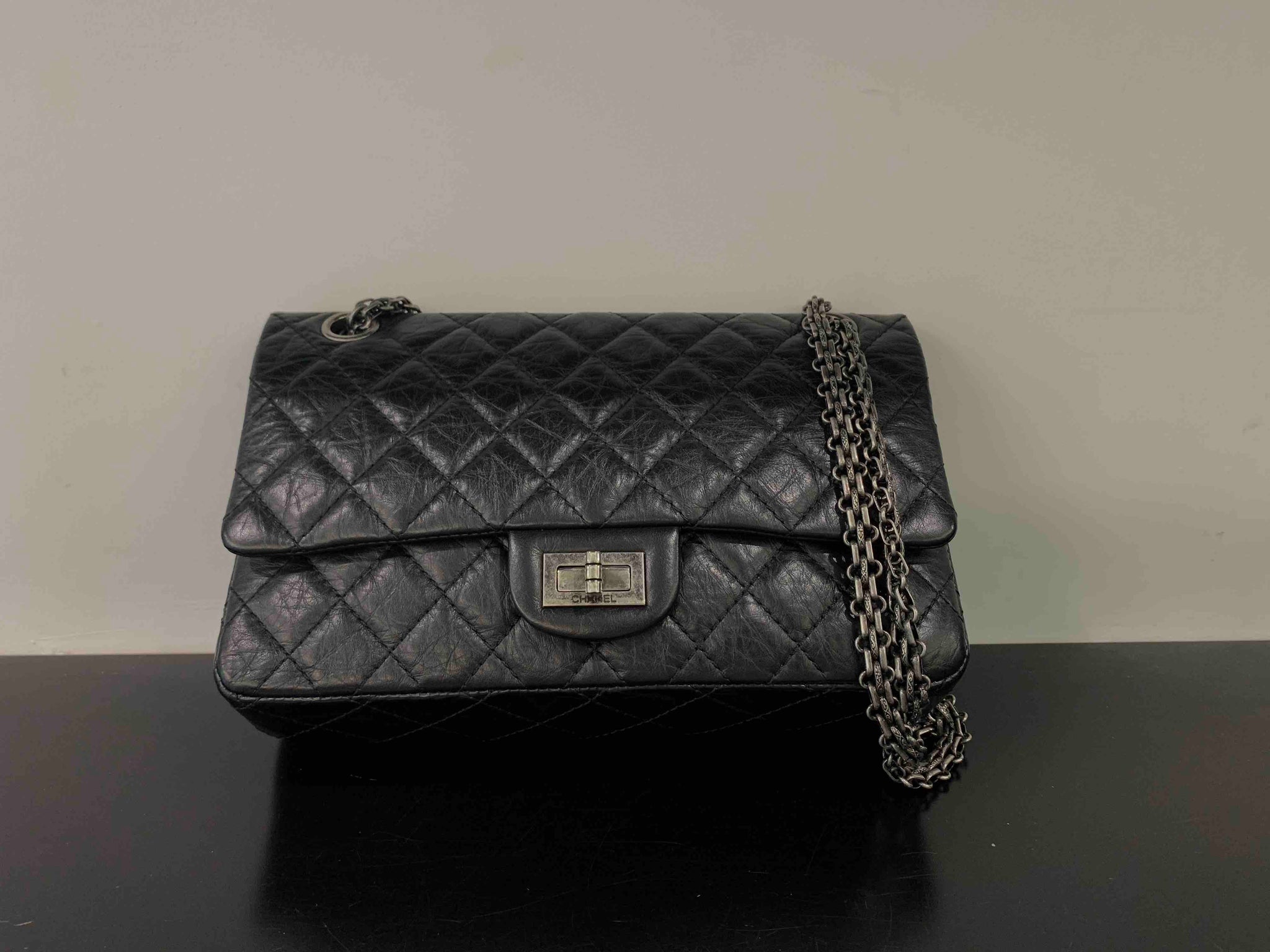 CHANEL Jumbo double flap bag in black smooth quilted lamb leather  VALOIS  VINTAGE PARIS
